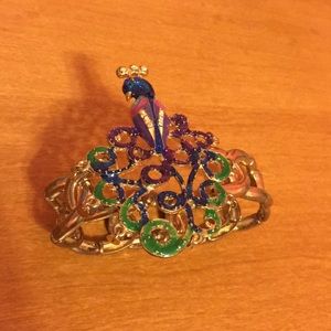 Golden peacock bracelet by designer Betsey Johnson